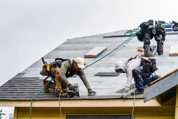 Professional Roofing technician working in Strongstown, PA